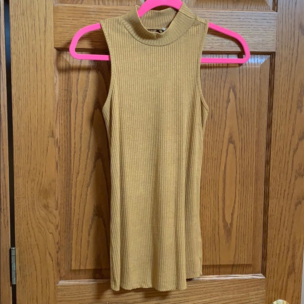 Mock neck sleeveless layering piece